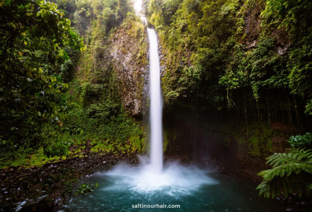 La Fortuna Waterfall plunging 70 meters into a jungle pool outside Arenal, Costa Rica
