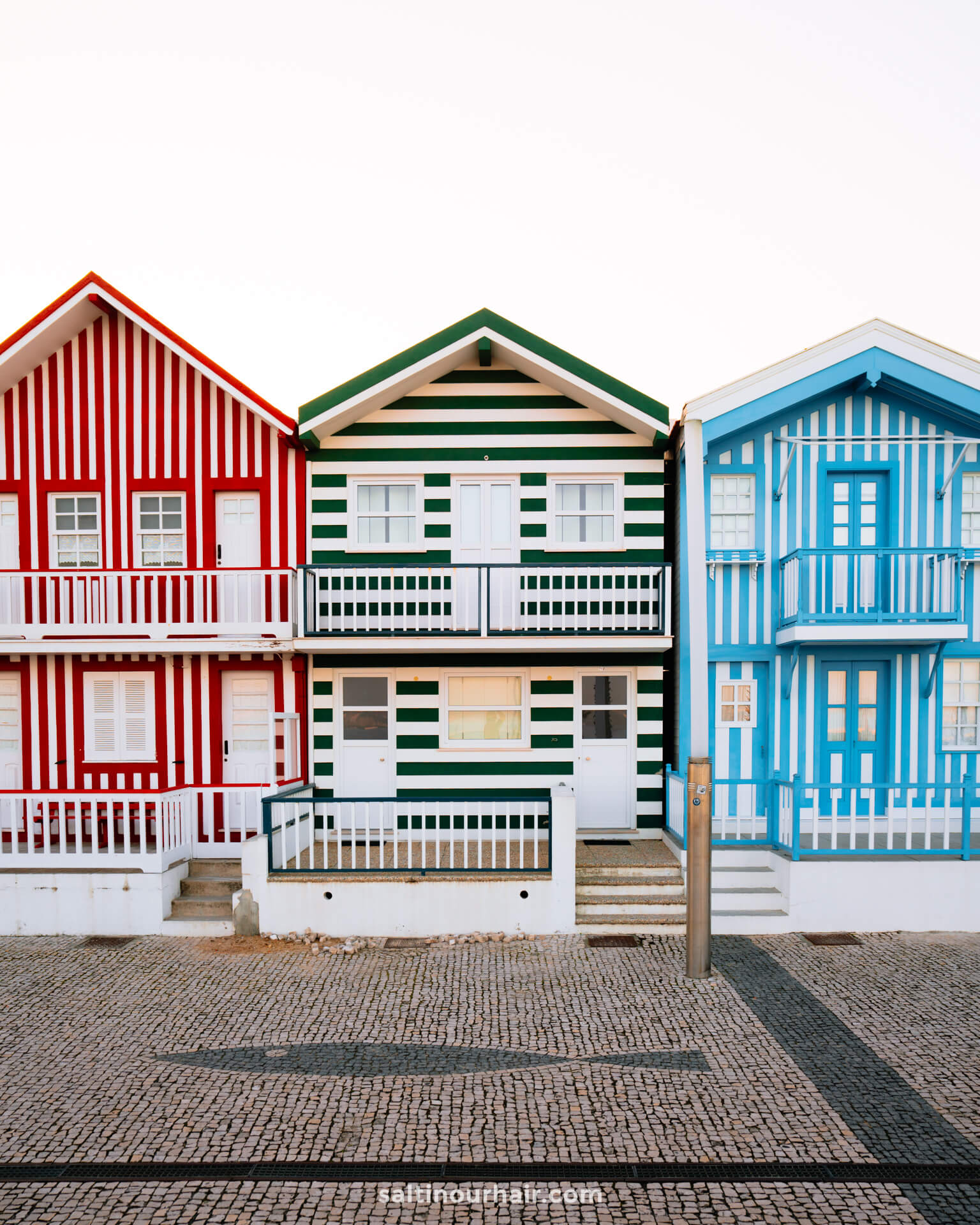 colorful beach houses portugal