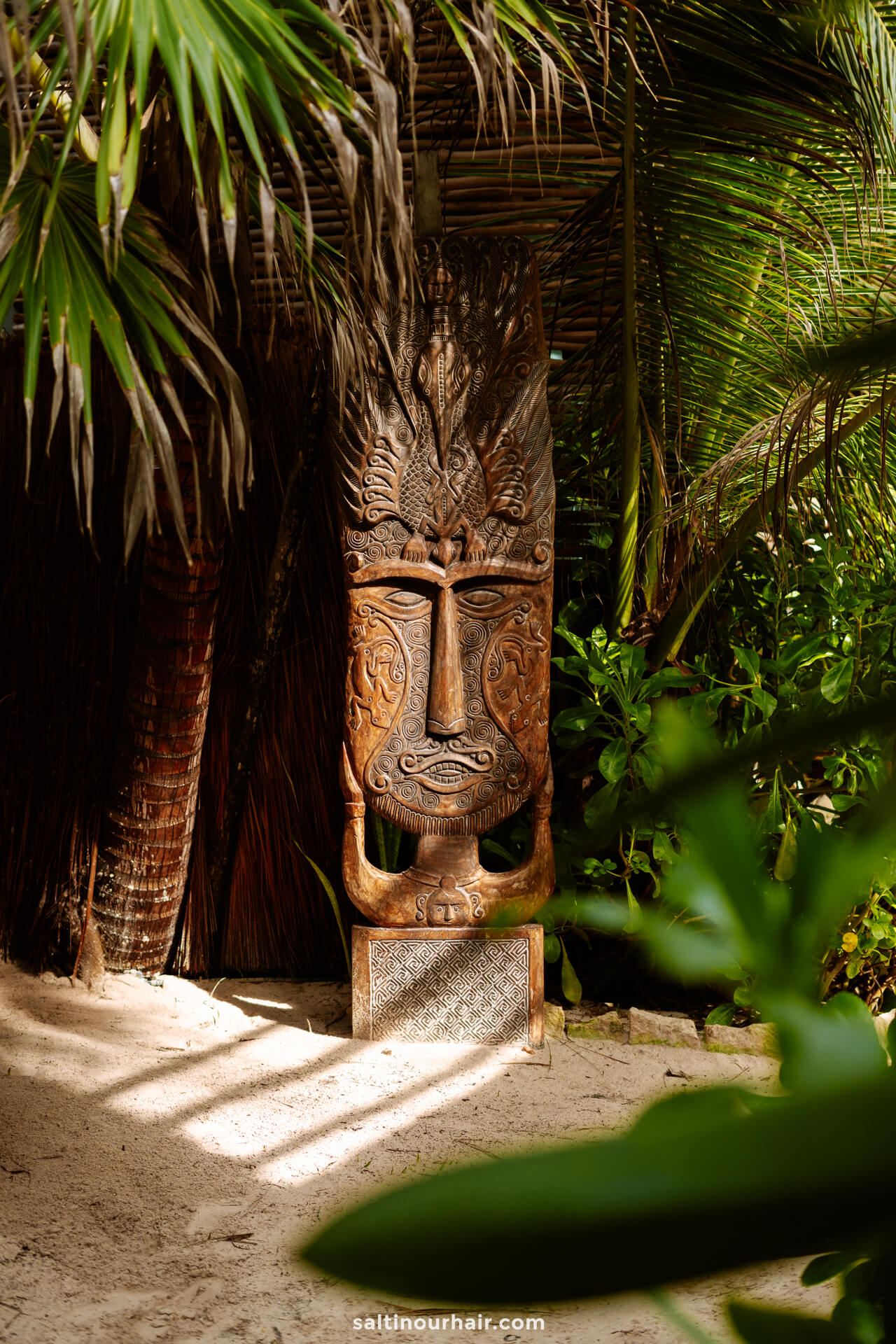 tulum mexico wooden statue