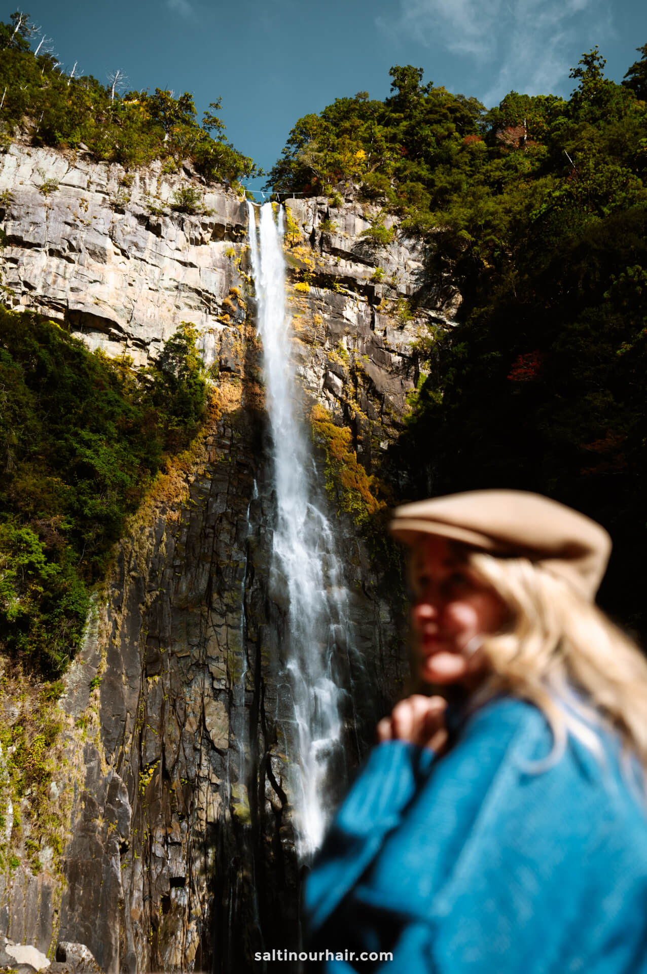 woman waterfall background