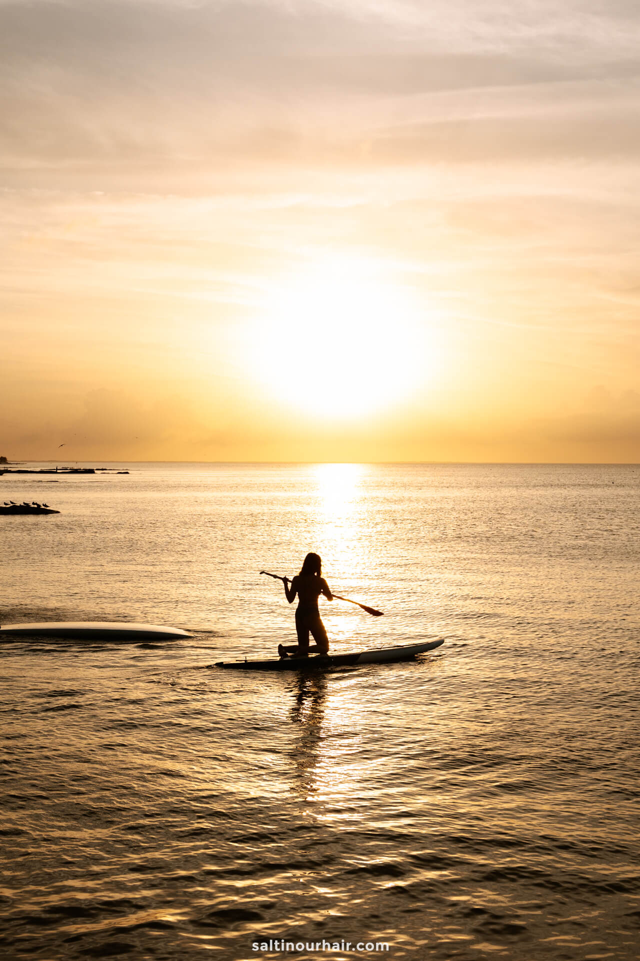 paddle board sunset playa Holbox Mexico