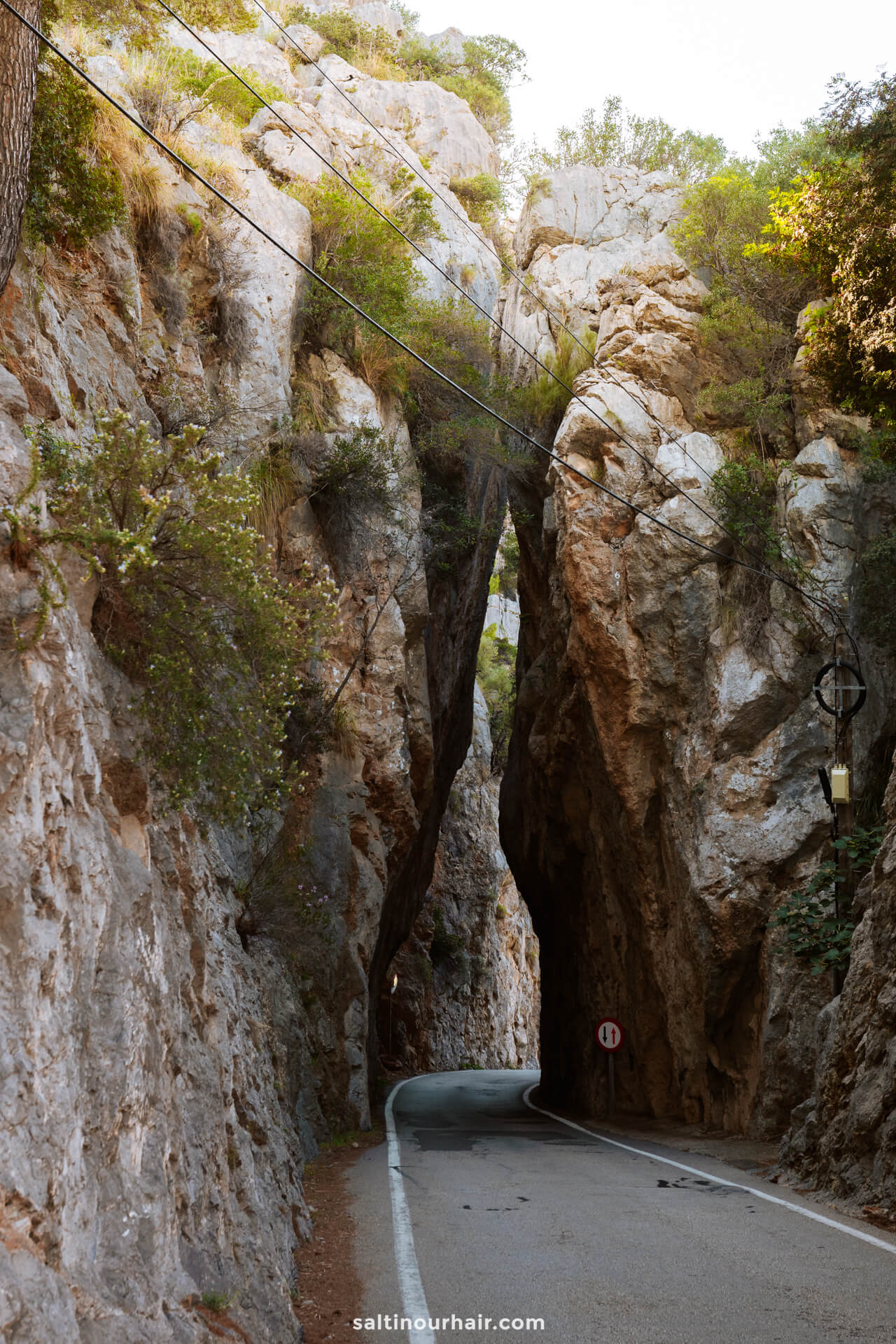 narrow road rock tunnel sa calobra mallorca