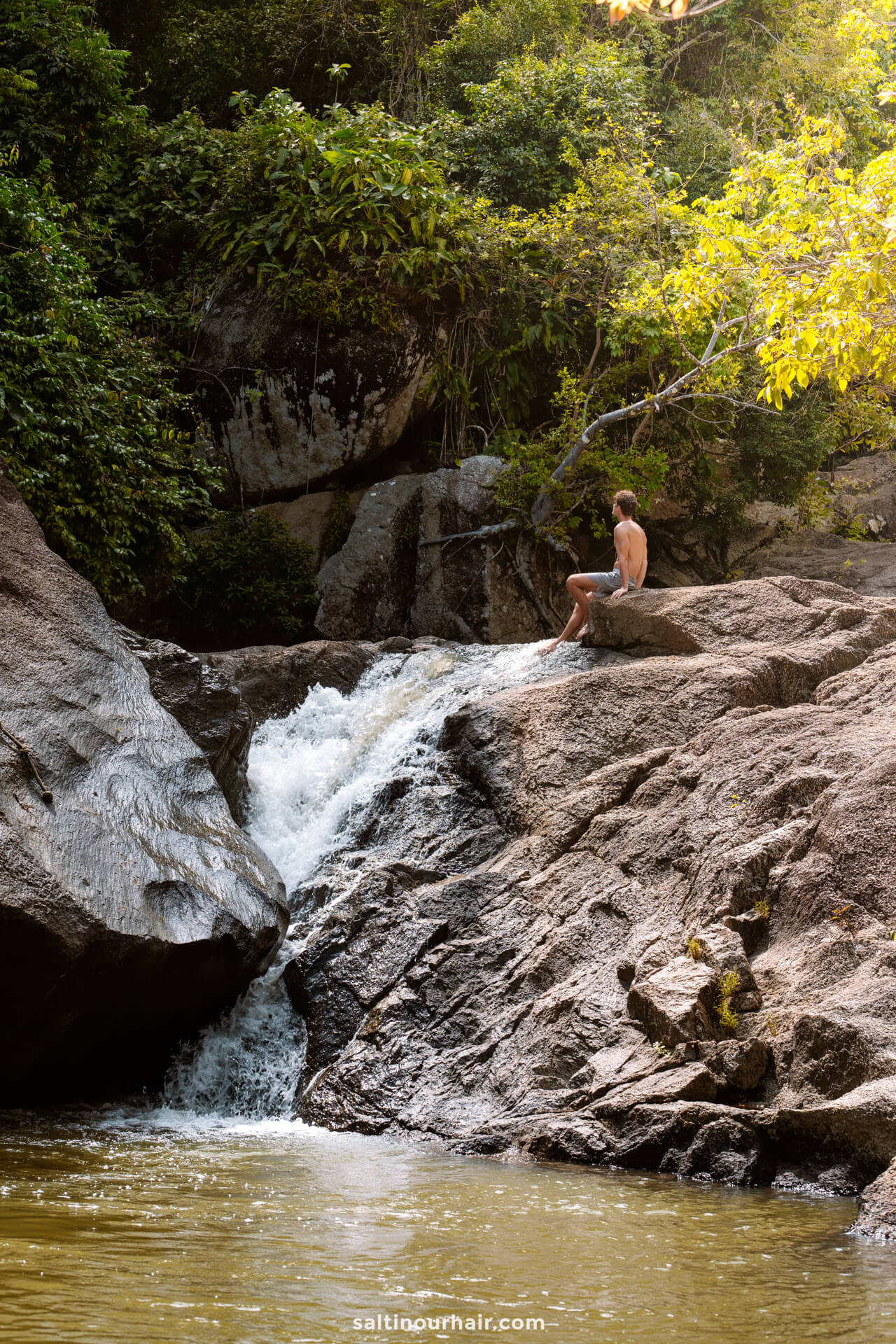 Waterfall man climbing Koh Phangan thailand