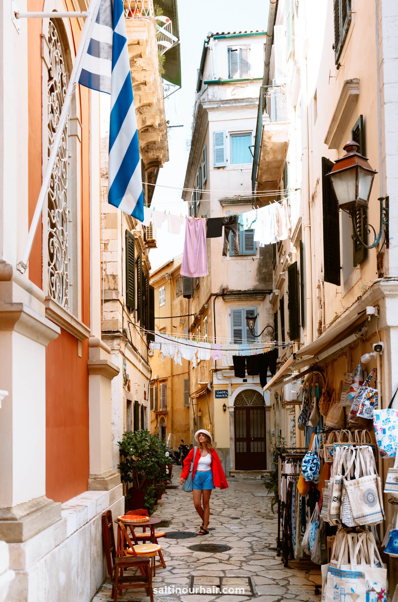 girl in cute street corfu town greece