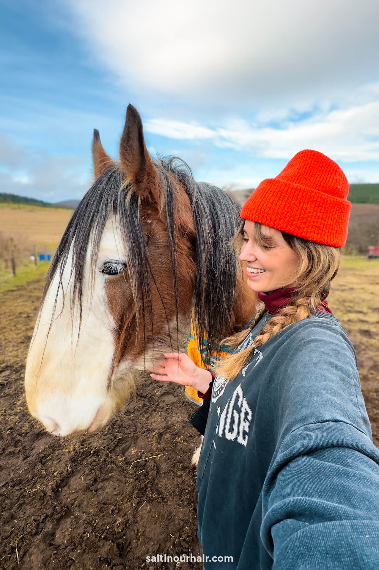 girl cuddling irish cob horse scotland 