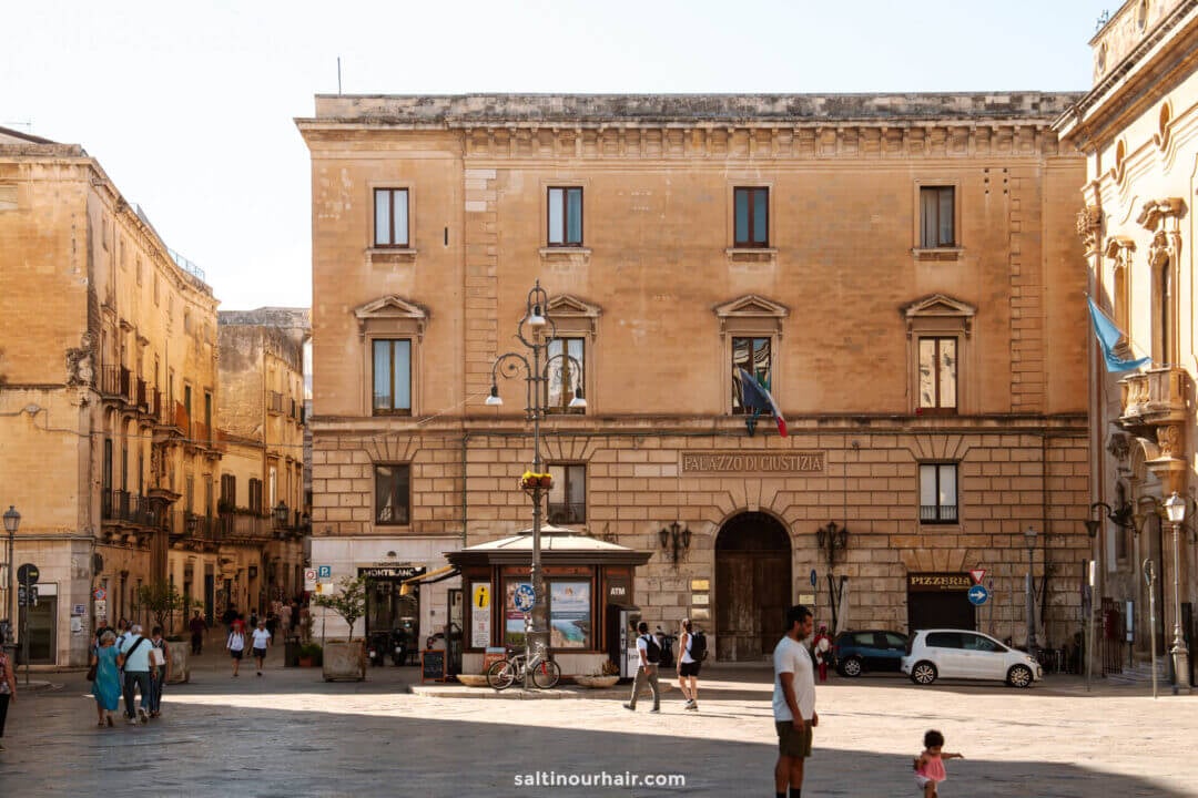 sunny Italian square in Lecce, Italy, in front of the Palazzo di Giustizia